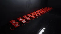 a row of red telephones in a dark room